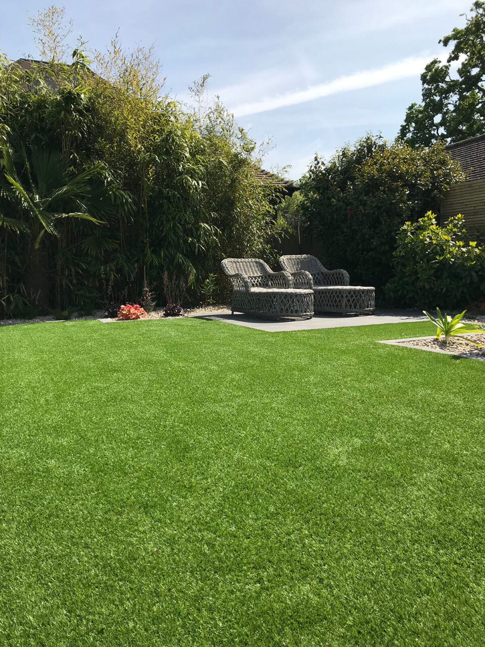 Artificial grass lawn with seating